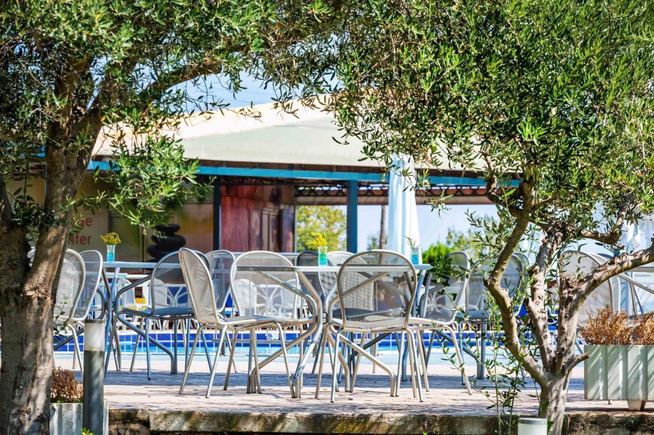 Grand Platon Hotel Olympiaki Akti Bagian luar foto